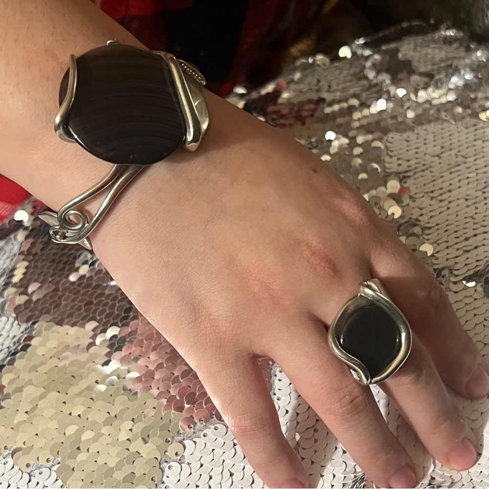 Black and Silver Statement Ring with Bold Designedfork  of a